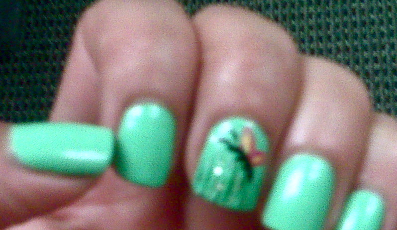 green-nails-manicure with butterfly